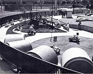 Mitchell Park, Palo Alto CA, The pedal car freeway and “gopher holes” found in this innovative playground are characteristic of Royston’s imaginative designs